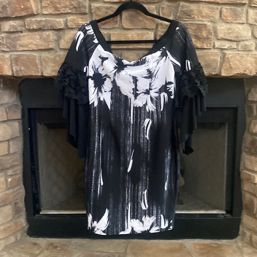 NWOT  black and white off the shoulder dress. Sleeves have lace ruffle.  M